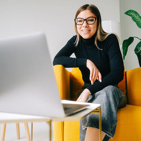 SOLUTIONS_BOARD_sm_0000_caucasian-cheerful-businesswoman-having-video-call-2022-07-26-01-55-44-utc