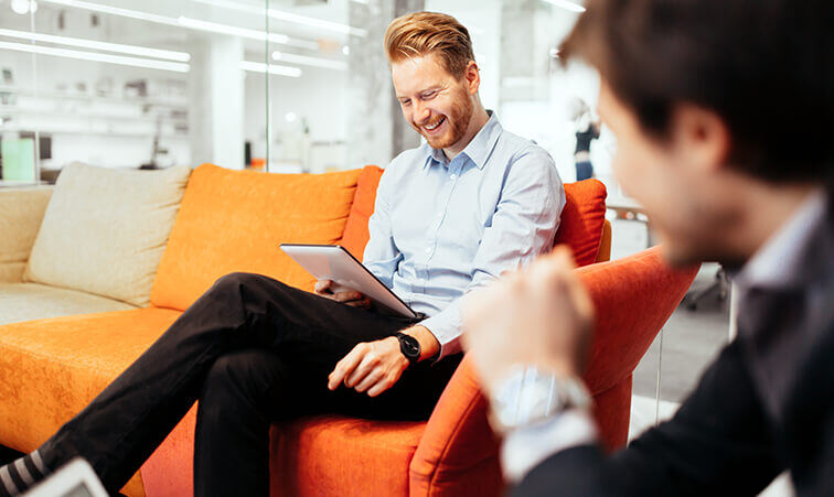 SOLUTIONS_BOARD_lg_0009_business-people-looking-at-their-devices-2021-08-28-20-33-44-utc