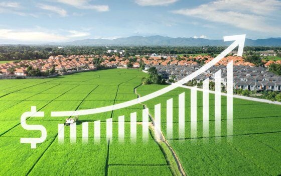 Land value in aerial view consist of landscape of green field or agriculture farm, residential or house building in village, growth graph of rate market price. That real estate or property for agent, real estate agent, investor and lawyer to owned, sale, rent, buy, purchase, mortgage and investment in Chiang Mai of Thailand.