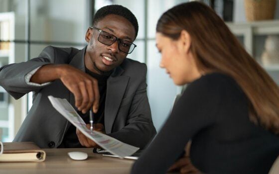 Financial advisor talking to customer